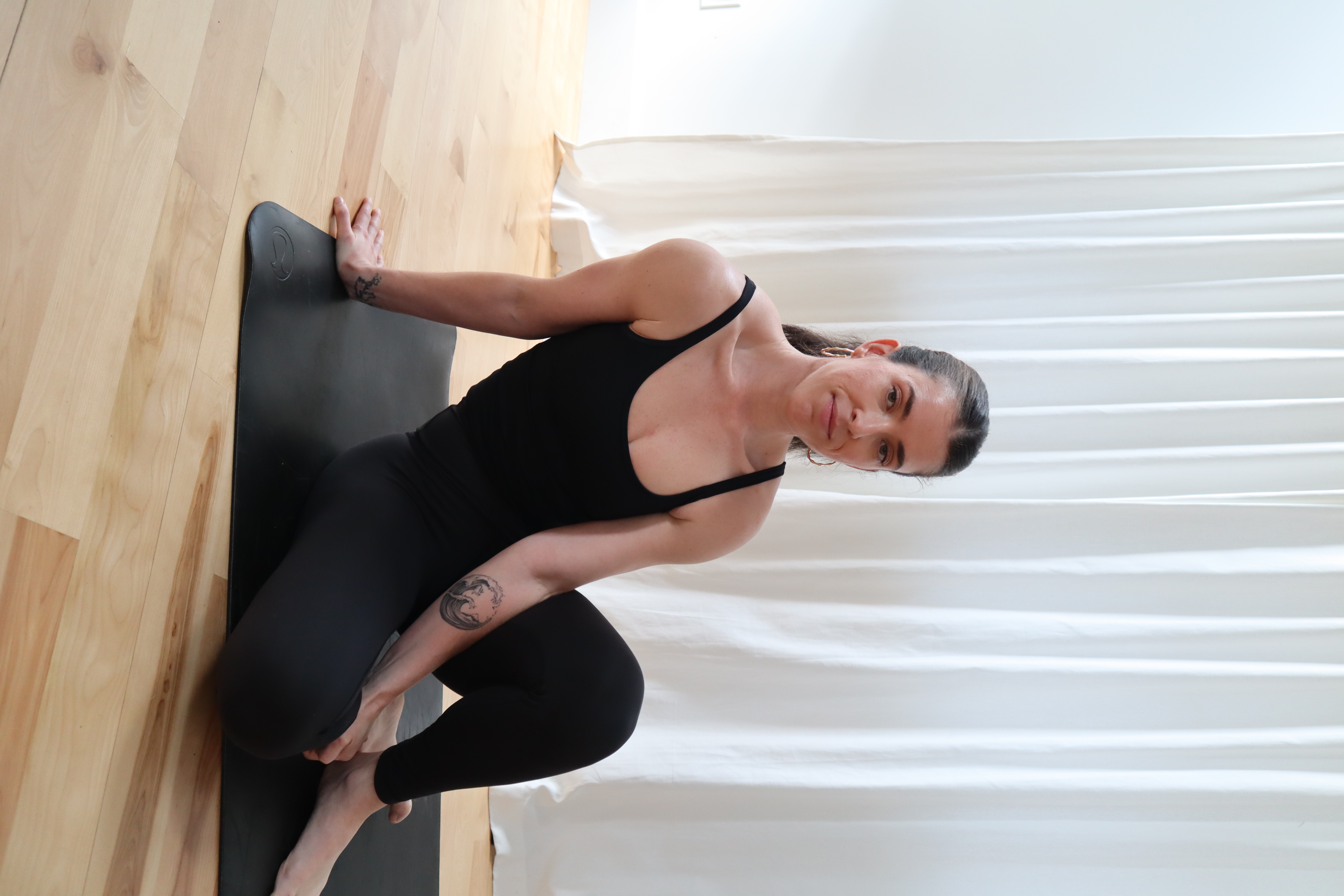 Victoria Scully, professional Pilates instructor, teaching in studio